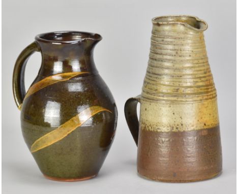 MARY RICH (1940-2022); a stoneware pitcher with pronounced ribbing, impressed M mark, height 24cm, and a Carole Glover slipwa