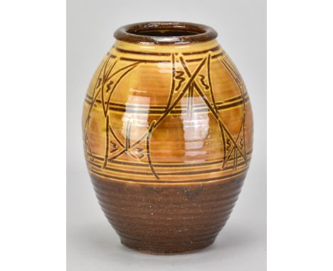 RAY FINCH (1914-2012) for Winchcombe Pottery; a slipware jar partially covered in yellow galena with iron decoration, impress