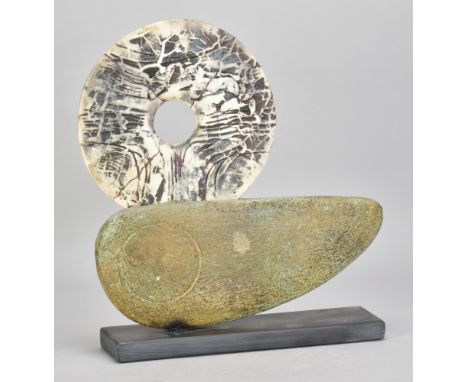 PETER HAYES (born 1946); a stoneware boat form with fractured smoky white disc mounted on slate base, incised signature, leng