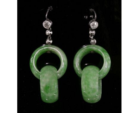 A pair of Art Deco jade and diamond drop earrings,with three graduated old European cut and old eight cut diamonds, milligrai