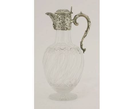 A Victorian silver-mounted cut glass claret jug,William Hutton & Sons Ltd., London, 1898, the ovoid shaped body with spiral f