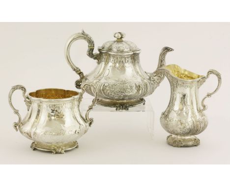 A Victorian and George V silver composite three-piece tea service,the teapot and sugar bowl Charles Frederick Hancock, London