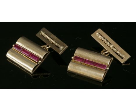 A pair of rose gold synthetic ruby cufflinks, c.1940,with a rectangular plate, composed of two parallel 'D' section tubes, wi