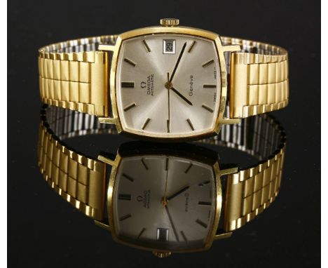 A gentlemen's 18ct gold Omega Automatic Genève strap watch,on a later gold-plated bracelet.  A cushion-shaped case with fine 