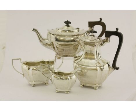 A George V four-piece silver tea service,JC Ltd., Birmingham, 1922-24,baluster fluted form, comprising: coffee pot and teapot