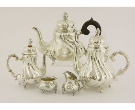 A modern German silver four-piece tea service, comprising; teapot, hot water jug, creamer and sugar bowl, of wrythen baluster