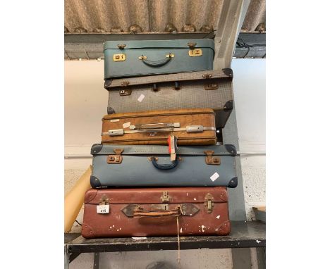 5 vintage suitcases