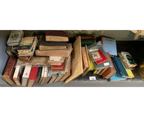 Shelf of various books