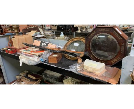 Shelf of collectables including walking sticks, small gilt framed mirror, ornate clock case (no works) marbles, box of domino