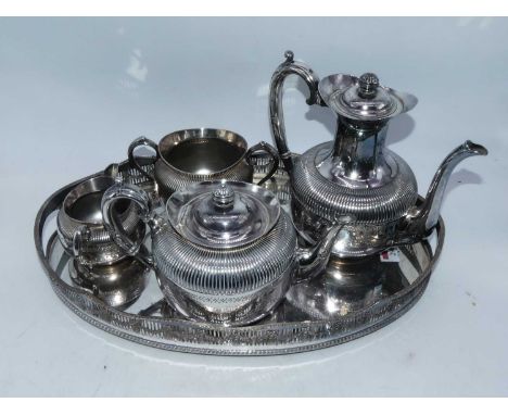 A silver plated four piece tea and coffee service, of half reeded form with engraved floral decoration on twin handled oval g