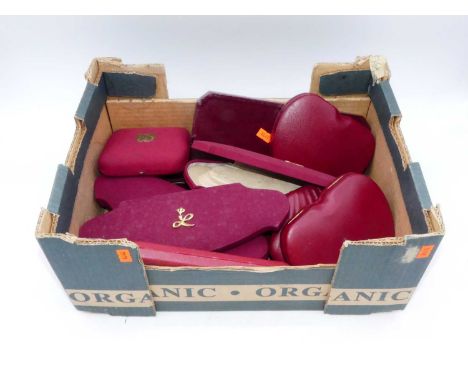 A collection of various vintage red jewellery boxes