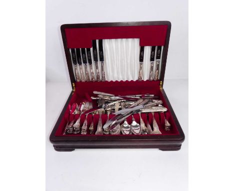 A mahogany cased canteen of silver plated Kings pattern flatware; together with an empty oak canteen 