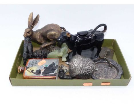 A collection of miscellaneous items, to include a Staffordshire cow creamer, a cold painted model of a Highland terrier, poli