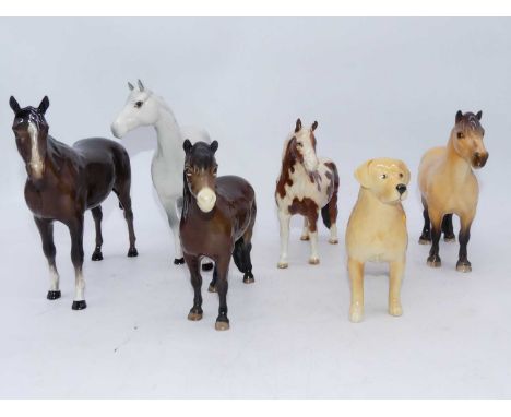 A Beswick Skewbald Pinto pony, model No. 1373, a Beswick Highland pony, Macionneach Model No. 1644, an Exmoor pony Heatherman