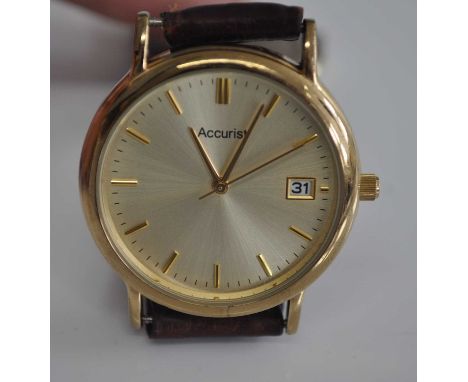 A gents gold plated manual wind wrist watch having a 17 jewel mechanical movement, case dia. 35mm, together with a gents Accu