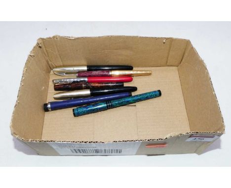 A collection of vintage fountain pens to include Parker, and Waterman