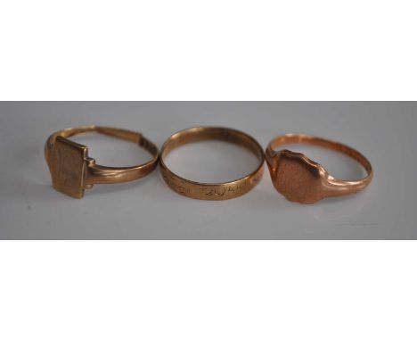 A 9ct gold signet ring, one other similar, and a 9ct gold band ring, gross weight 5.5g (3)