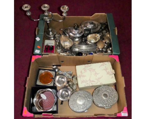 Two boxes containing a collection of silver plated wares to include a part tea and coffee service, three branch table candela