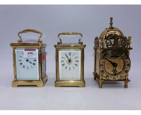 An early 20th century lacquered brass carriage clock, the enamelled dial showing Roman numerals, having visible platform esca