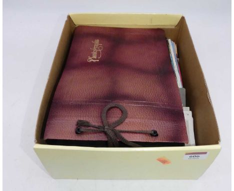 A collection of vintage photographs and postcards 
