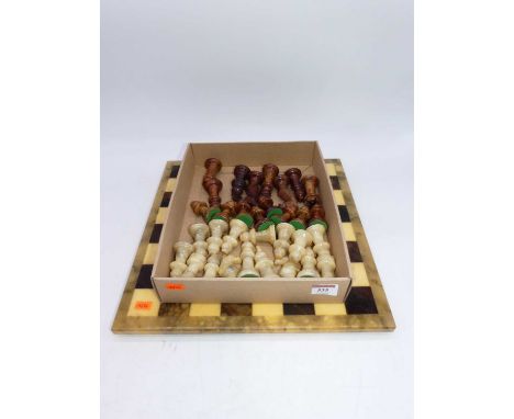 A polished hardstone chess set, 32 pieces 