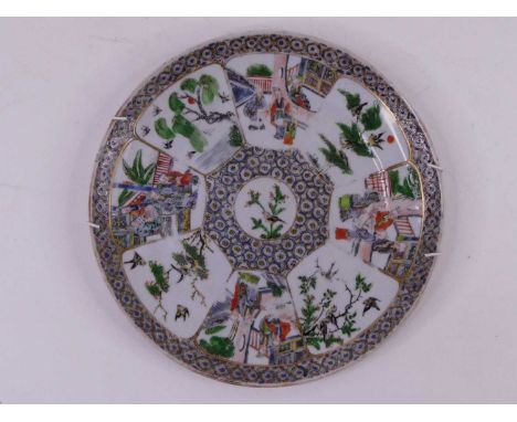 A set of four Chinese export plates, each having four panels decorated with various figures within landscapes interspersed wi