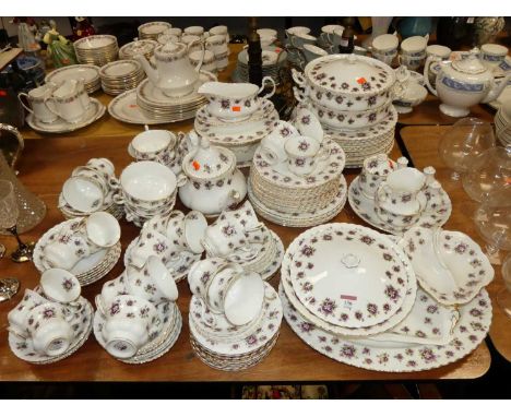An extensive Royal Albert dinner and tea service, in the Sweet Violets patternCutlery marks throughout.Some damaged items bei