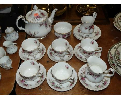 A Royal Albert Bone China six-place setting tea service, in the Lavender Rose patternExtremely grubby.  Underglaze crack unde