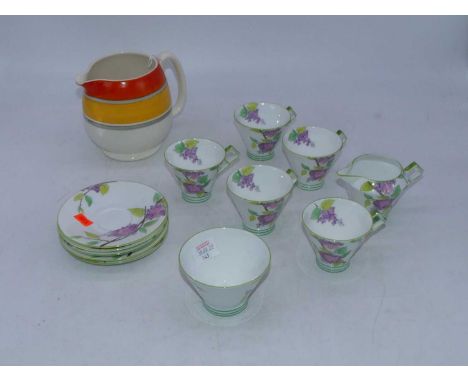 A Foley E. Brain &amp; Co Art Deco part tea service, decorated in the Lilac pattern, having printed mark verso (lacking teapo