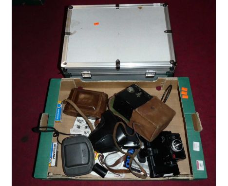 An Ensign Selfix 820 camera, with various accessories to include Olympus 65-200mm zoom lens, Jessop Bouncer electronic flash 