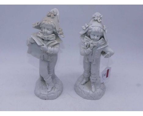 A late 19th century continental blanc-de-chine figural spill holder, h.23cm; together with one other similar figure (2)The pi