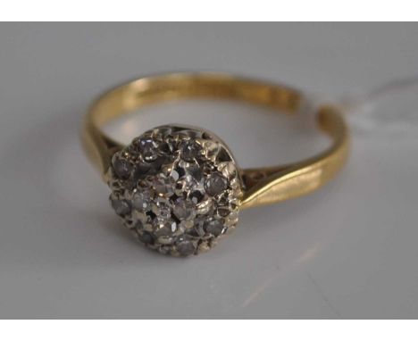 An 18ct gold diamond flowerhead cluster ring, 2.9g, size J