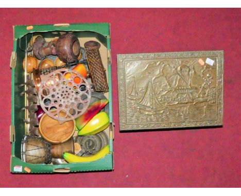 A box of miscellaneous items, to include a cast iron coat hook, iron trivet, painted wooden ornamental fruit etc 