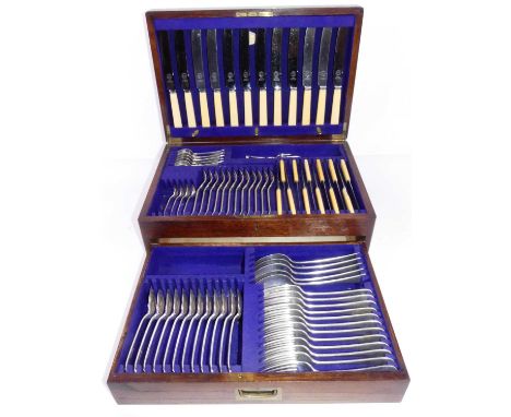 An early 20th century oak cased canteen of mixed silver plated flatwareMissing two teaspoons, otherwise appears complete.