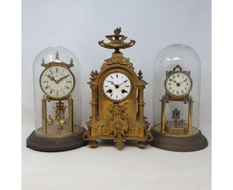 An early 20th century gilt metal perpetual mantel clock, in glass dome and two other clocks  (3) 
