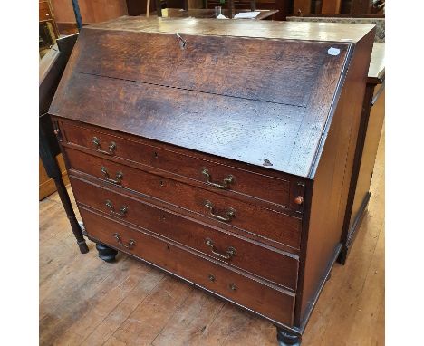 A 19th century oak bureau, 108 cm wide, a pair of oak cupboards, and a 19th century folding card table, 87 cm wide (4) 