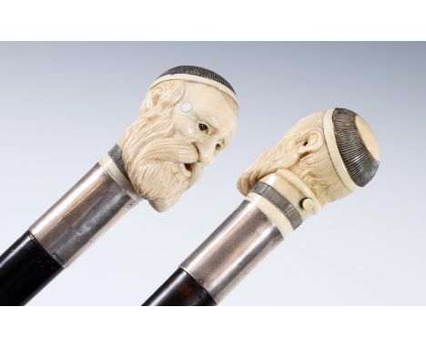 A 19th century automaton walking stick, with carved ivory handle in the form of a cleric's head, with rolling glass eyes and 