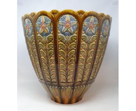 A Linthorpe Pottery jardiniere, decorated with stylised flowers, impressed mark to base, numbered 1983, 40 cm highReport by R