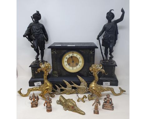 An early 20th century polished slate mantel clock, two spelter figures, and various brassware (qty) 