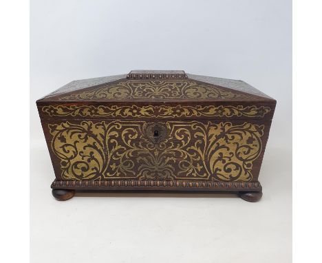 A Regency rosewood and brass inlaid tea caddy, sarcophagus form, hinge lid to reveal two compartments, lacking mixing bowl, o