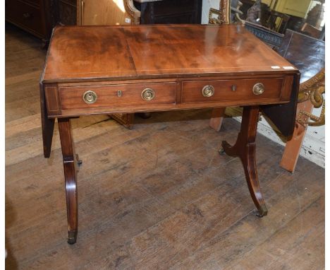 A 19th century mahogany sofa table, with two real and two false drawers, on twin end supports with splayed legs, 87 cm wide 