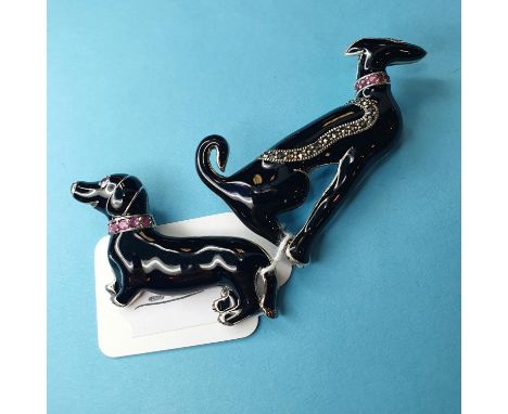 An Art Deco style black enamel dog brooch, and another similar (2) 