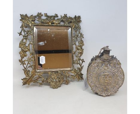 A 19th century Continental gilt metal flask, 17 cm high and a table mirror in a metal frame, 24 x 28 cm (2) 