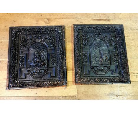 A pair of Flemish carved oak panels, with central domed cartouche carved a cherub and a swan, and a fawn,  69 x 60 cm 