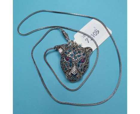 A silver, marcasite and ruby set panther necklace 