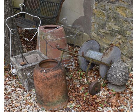 A terracotta rhubarb forcer, 50 cm, a composite stone finial, a garden planter, and other items 