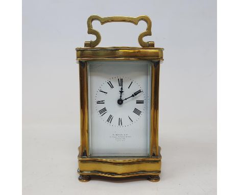 A carriage timepiece, the 5.5 cm wide enamel dial with Roman numerals and inscribed V Samuel, London, in a brass four pillar 