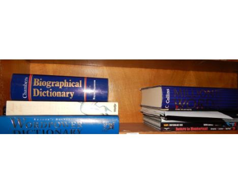 Three dictionaries and comic books, (1 shelf).