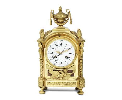 A late 18th century French ormolu mantel clock with calendar now with a 19th century replacement movementThe movement stamped