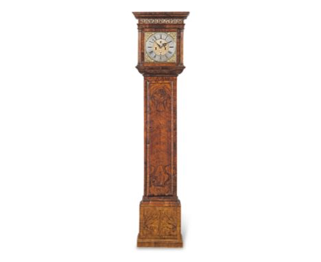 An early 18th century walnut longcase clock with published provenanceJeremiah Martin, LondonThe overhanging cornice over a pi